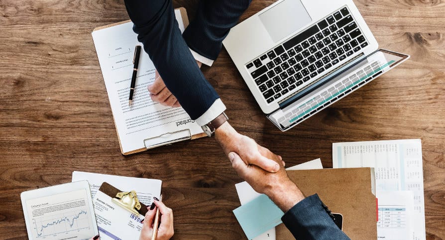 Business people shaking hands